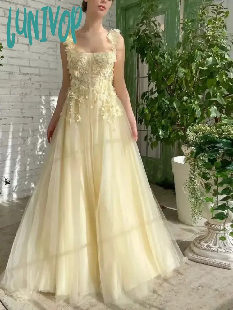 Trendy two-piece prom dresses for 2023-Lunivop Yellow Floral Prom Dresses Lace Applique Tulle with Belt Spaghetti Strap Long Sweep Train Graduation Homecoming Evening Gowns Trendy two-piece prom dresses for 2023-Lunivop Yellow Floral Prom Dresses Lace Applique Tulle with Belt Spaghetti Strap Long Sweep Train Graduation Homecoming Evening Gowns