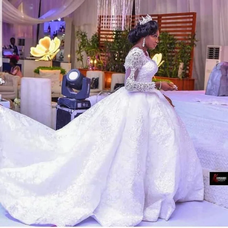Wedding dress designer style chic best--Lace African Wedding Dress Long Sleeves Round Neck Big Tail Tutu Skirt Wedding dress designer style chic best--Lace African Wedding Dress Long Sleeves Round Neck Big Tail Tutu Skirt
